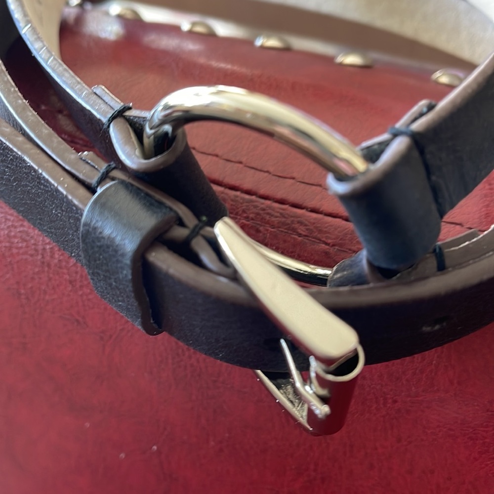 Lodi’s leather belt with silver links